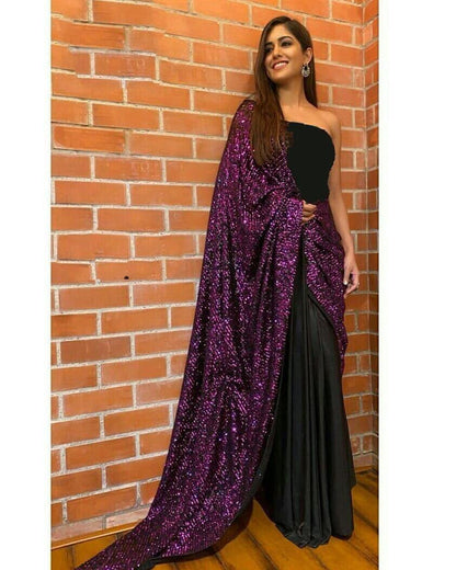 Purple sequence work and black half half glamorous saree