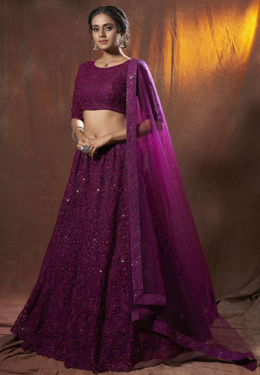 Purple soft net sequence thread work ceremonial lehenga choli