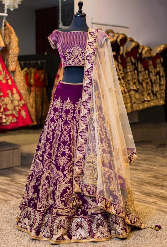 Purple velvet heavy embroidered wedding lehenga choli