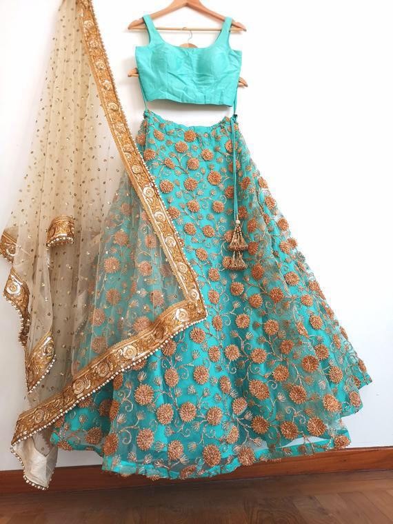 rama net heavy embroidered wedding lehenga choli