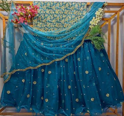 Rama net seuqence work wedding lehenga choli