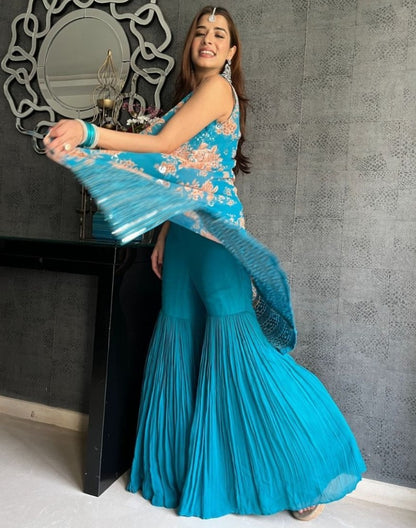 Rama print and thread sequence embroidered sharara suit with shrug