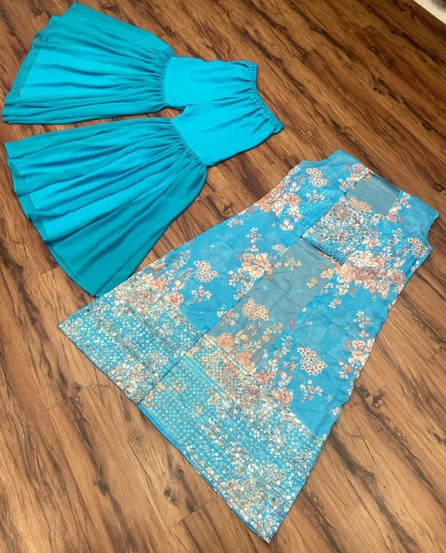 Rama print and thread sequence embroidered sharara suit with shrug