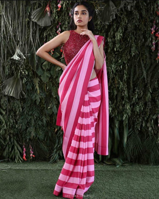 Rani and baby pink stripe satin georgette partywear saree