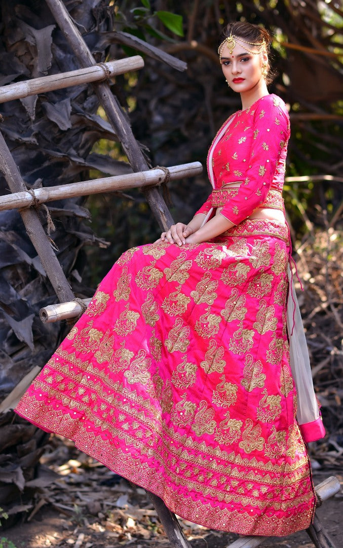 Rani pink silk designer embroidered heavy bridal lehenga choli
