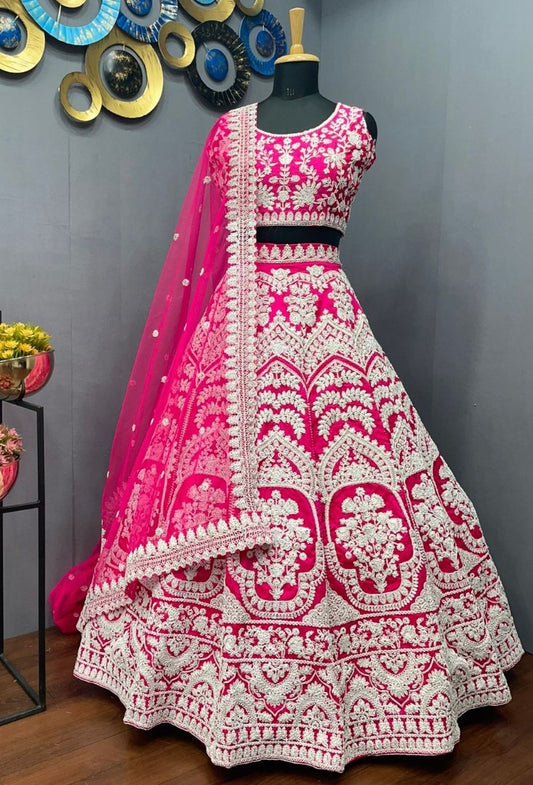 Rani pink tapeta silk heavy embroidered bridal lehenga choli