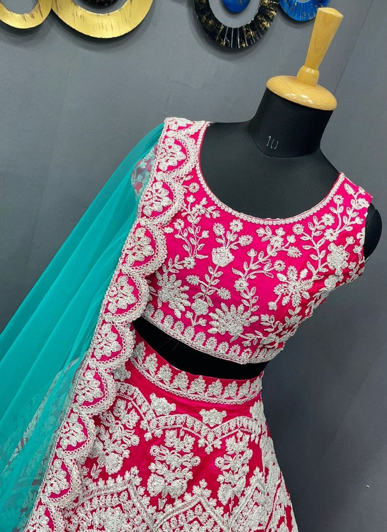 Rani pink tapeta silk heavy embroidered bridal lehenga choli