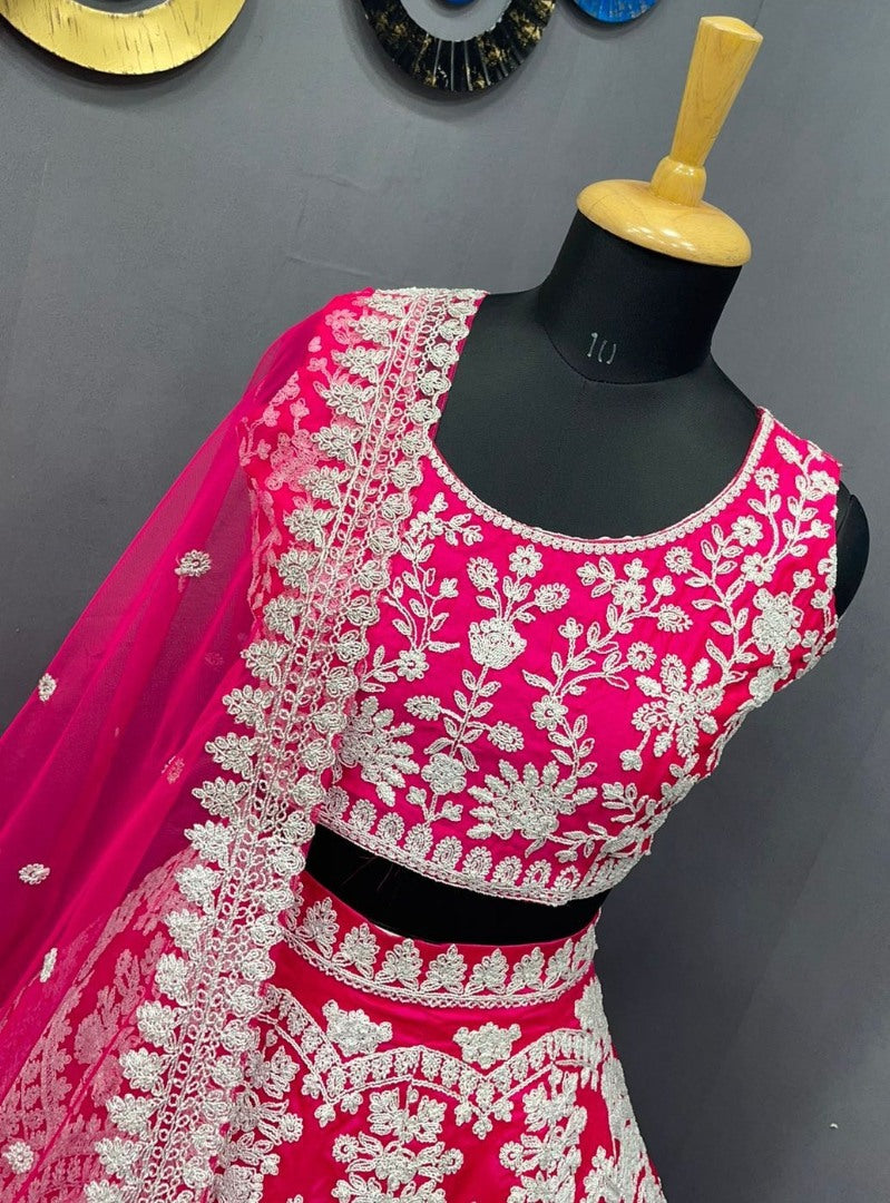 Rani pink tapeta silk heavy embroidered bridal lehenga choli