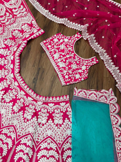 Rani pink tapeta silk heavy embroidered bridal lehenga choli