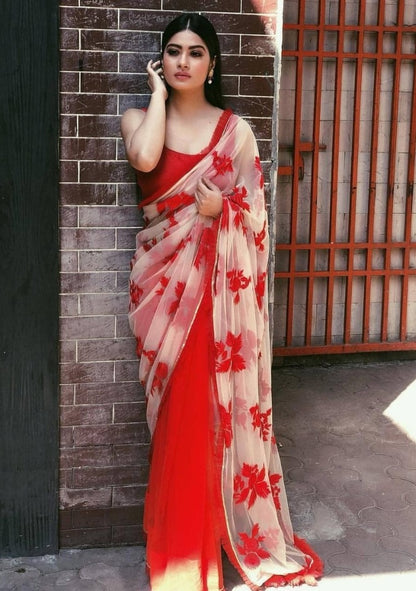red and cream half half embroidered partywear saree