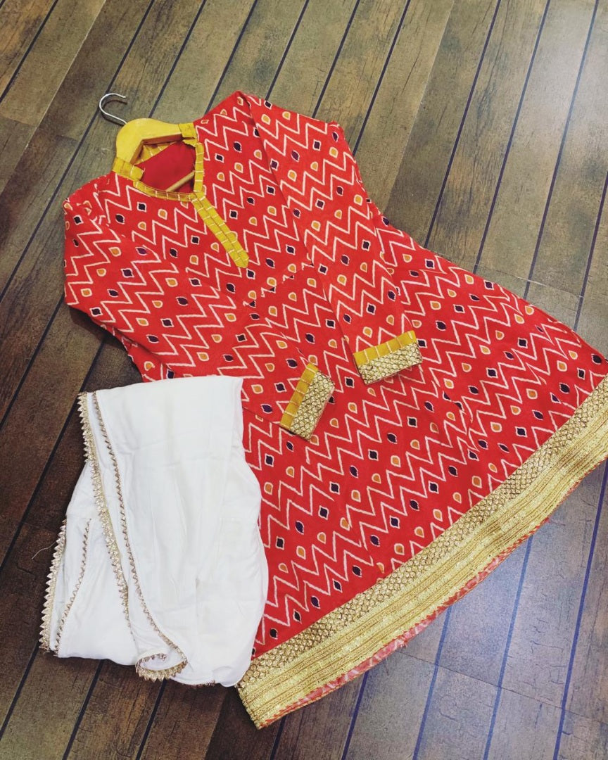 Red and white asam silk dhoti suit