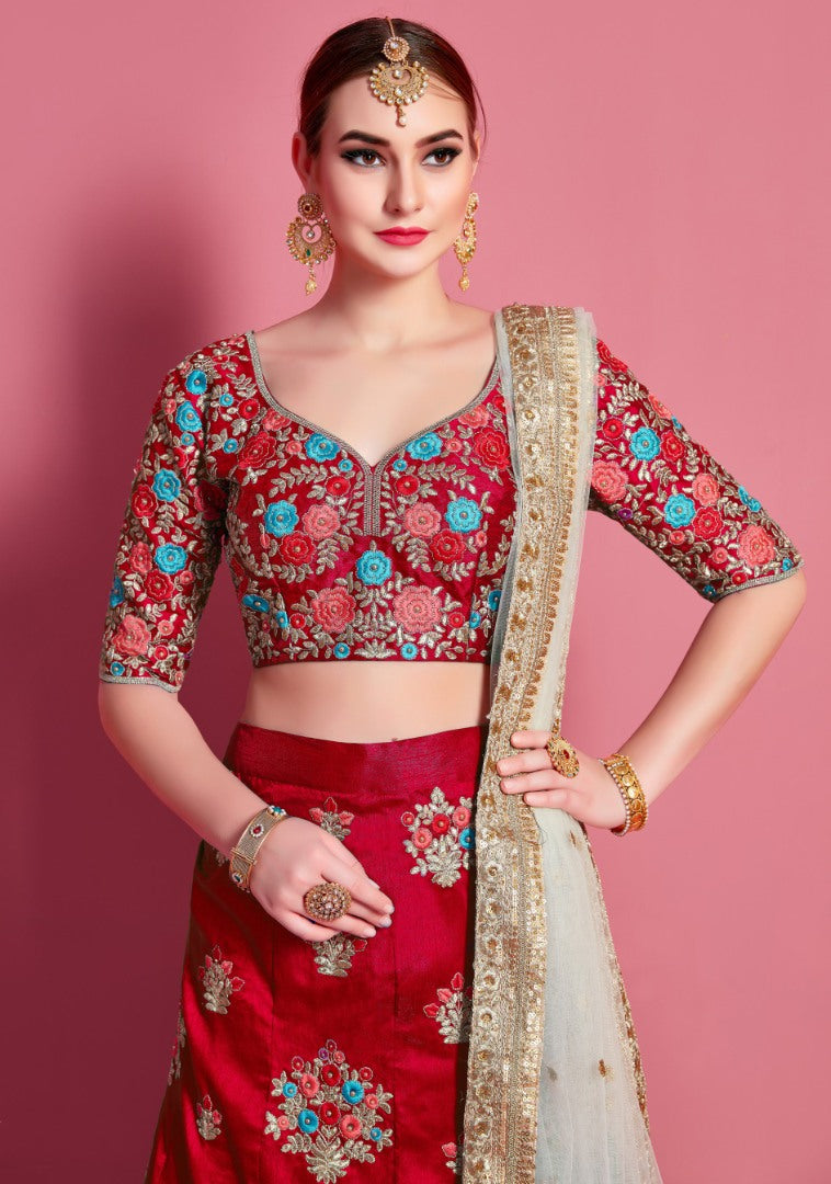 Red art silk embroidered work party wear lehenga choli