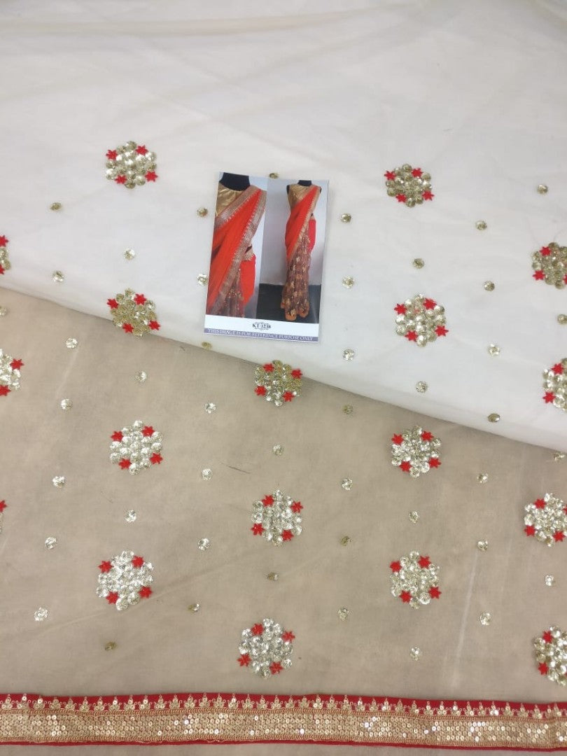 Red georgette pallu and net scut embroidered partywear saree