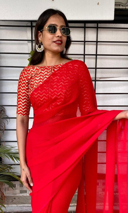 Red georgette pleated partywear saree with heavy sequence work blouse