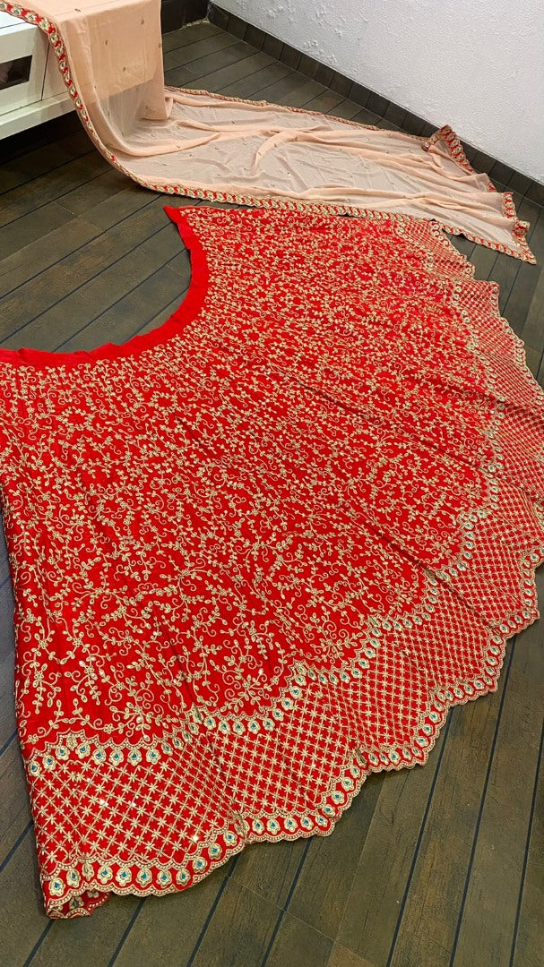 Red malai silk heavy embroidered wedding lehenga choli