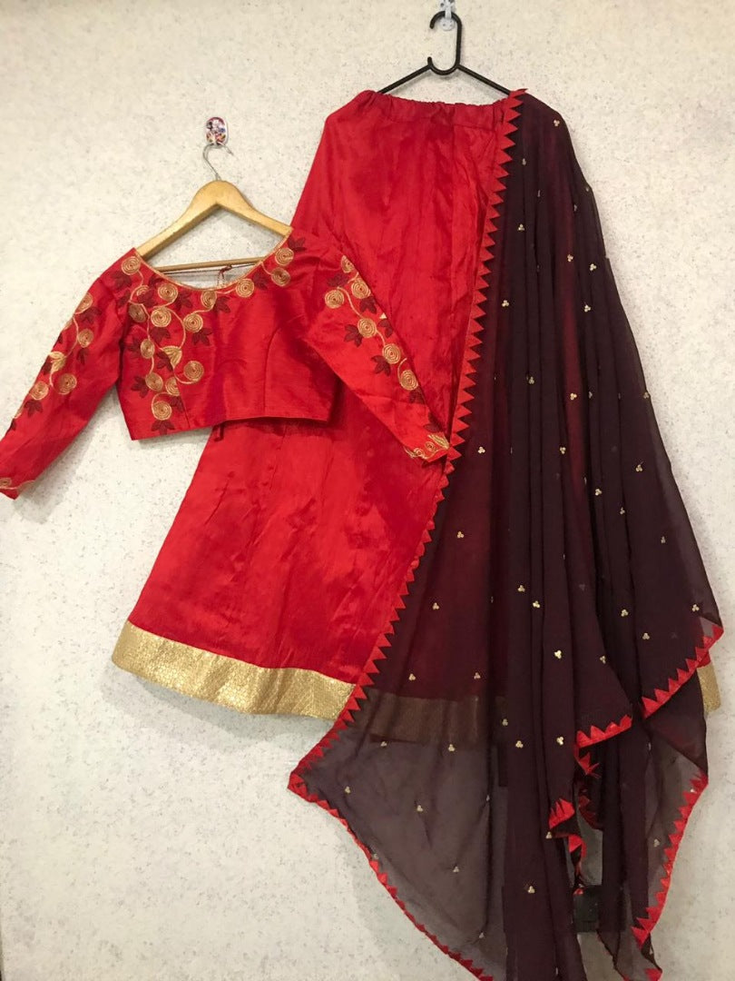 Red mulbari silk partywear lehenga with embroidered choli