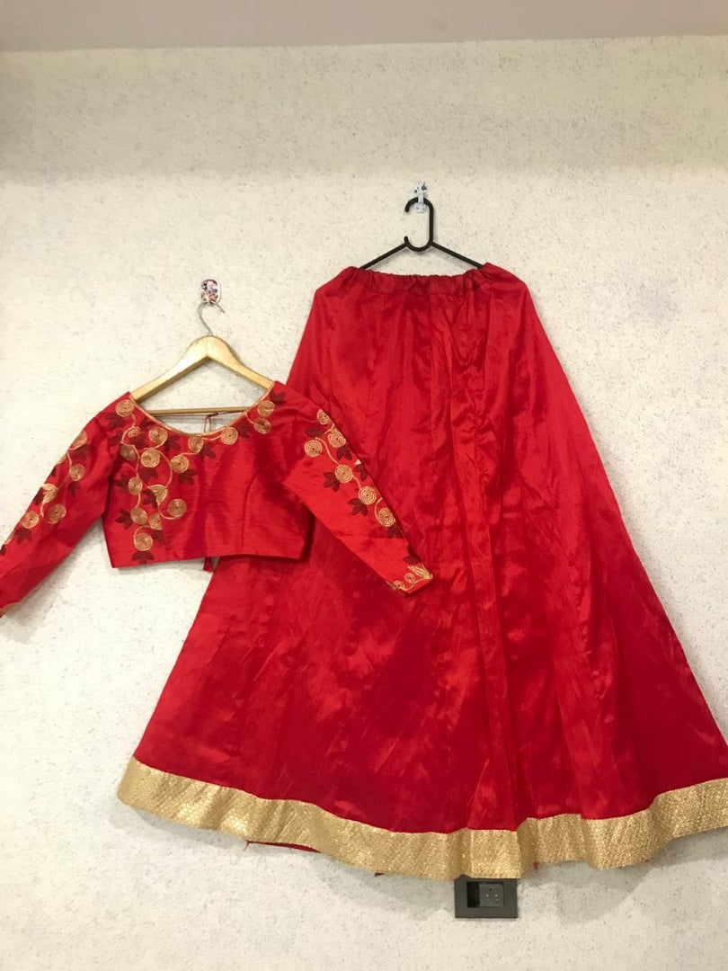Red mulbari silk partywear lehenga with embroidered choli