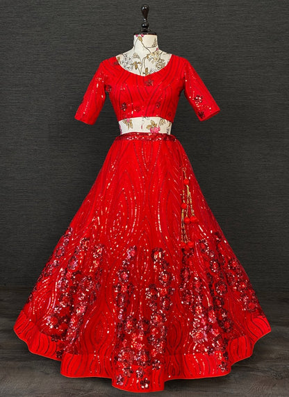 Red net heavy sequence embroidered wedding lehenga choli
