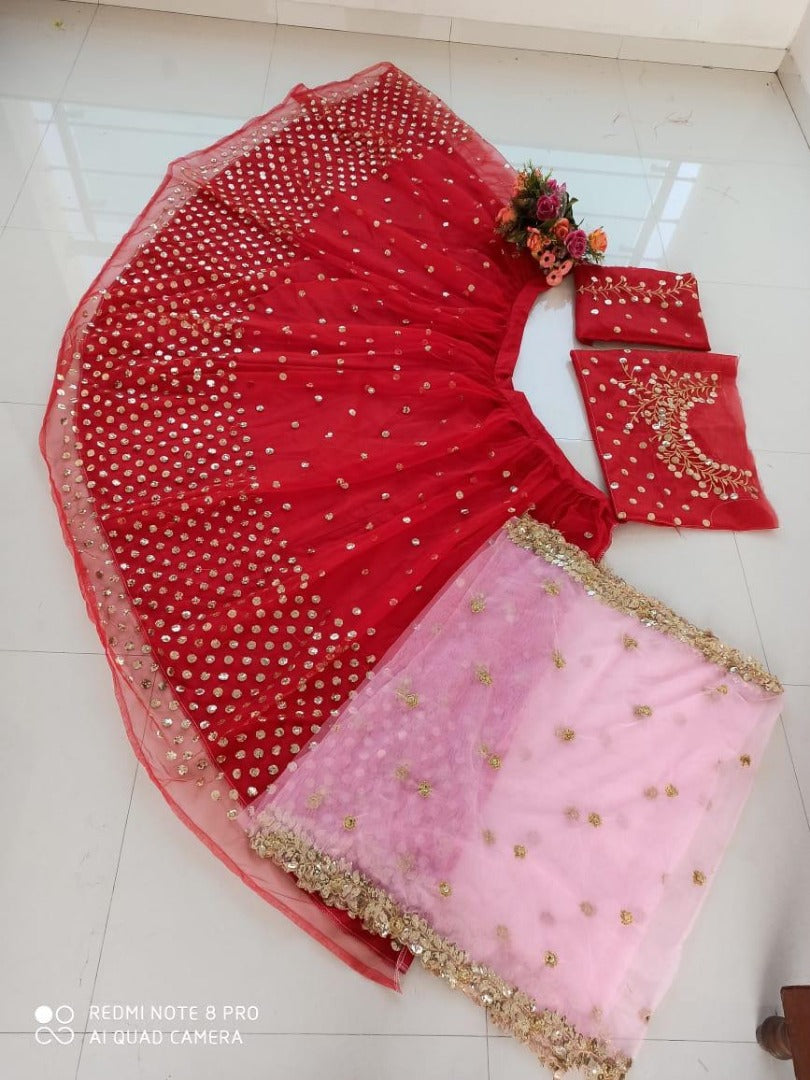 Red net sequence embroidery work wedding lehenga choli