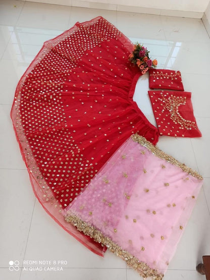Red net sequence embroidery work wedding lehenga choli