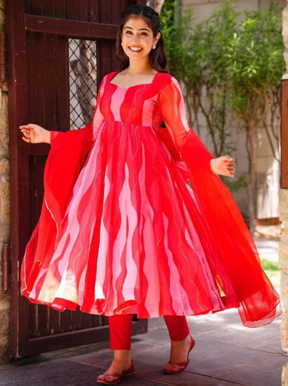 Red organza silk print and ribbon work anarkali suit