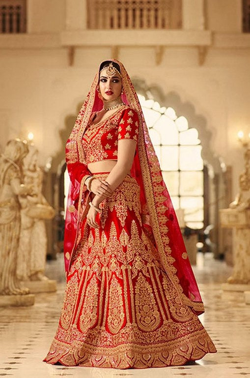 Red phantom silk heavy embroidered bridal lehenga