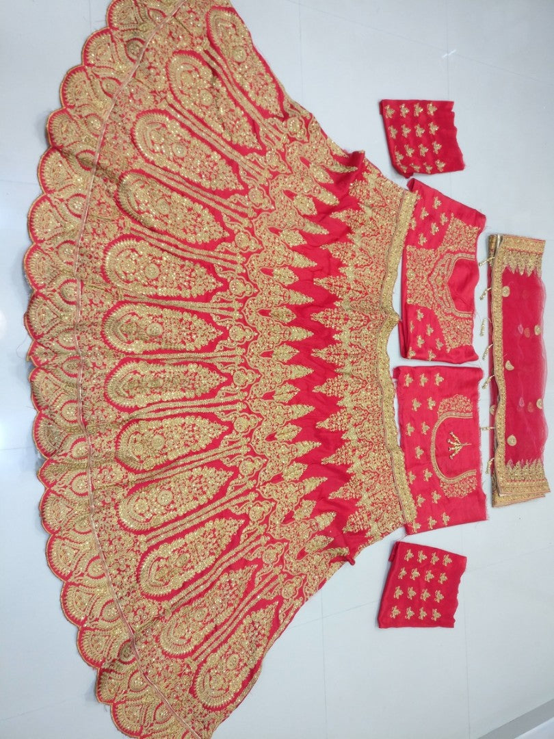 Red phantom silk heavy embroidered bridal lehenga