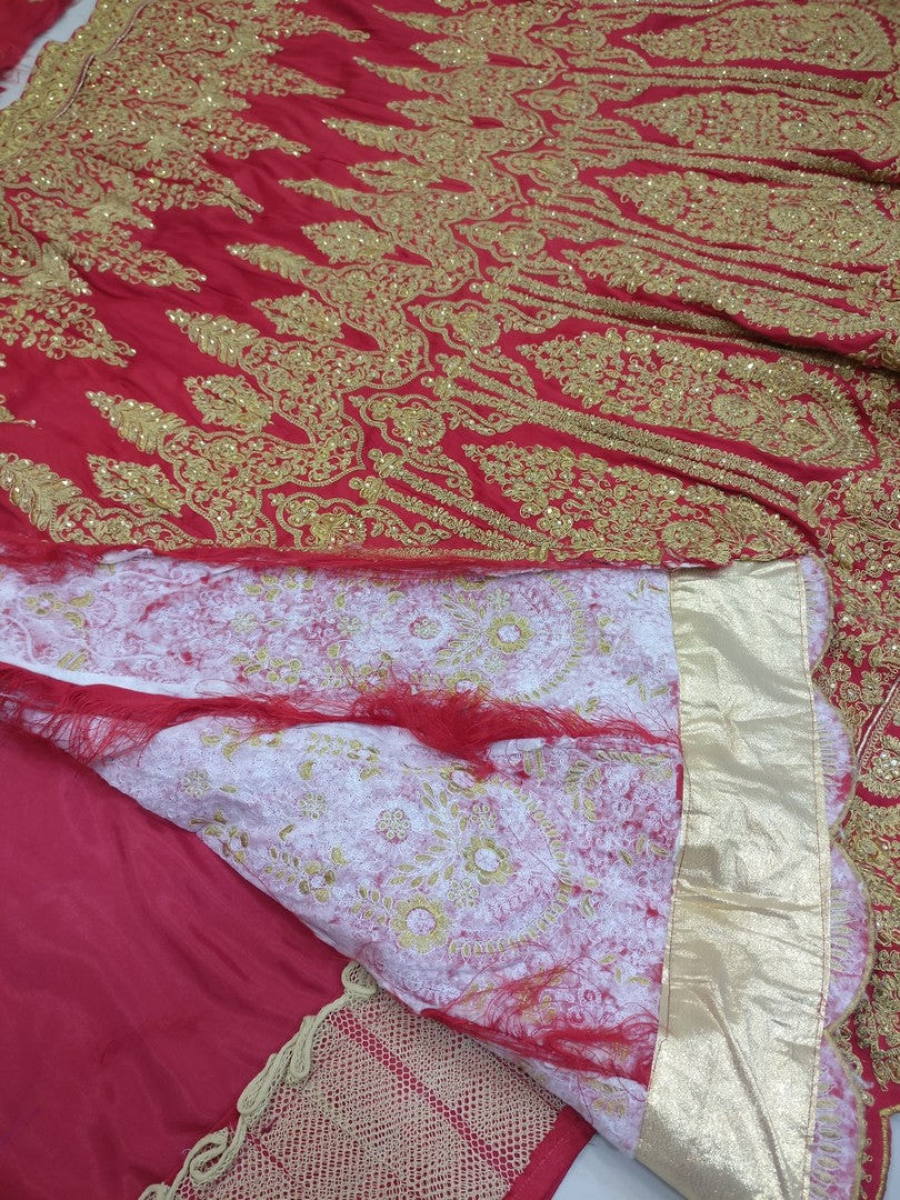 Red phantom silk heavy embroidered bridal lehenga