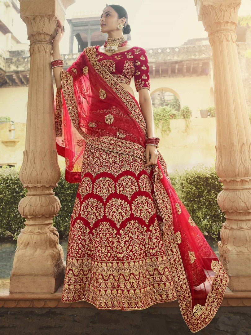 Red pure velvet stone and zari work bridal lehenga choli