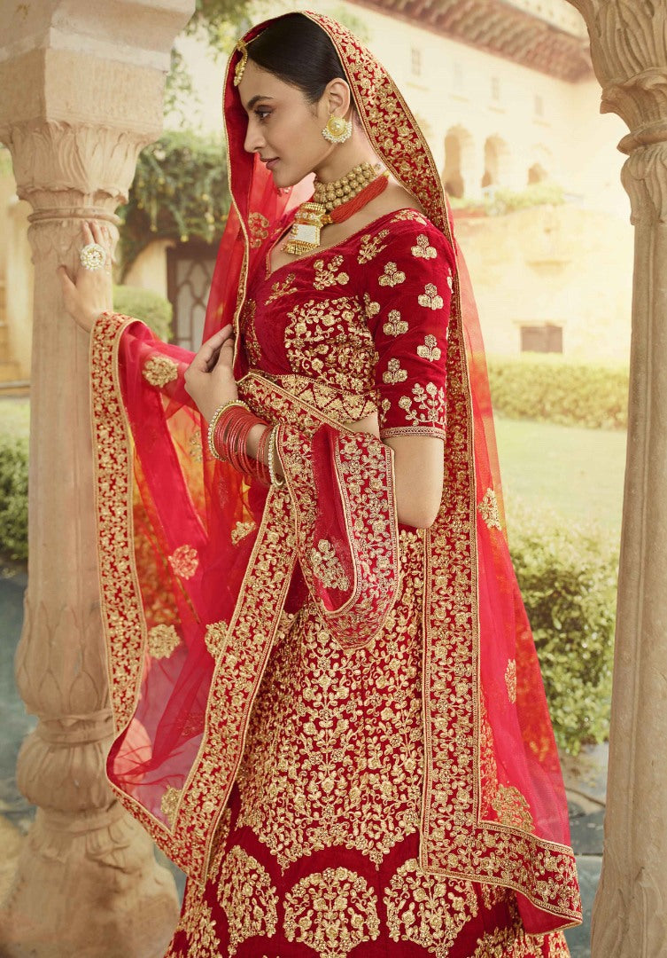 Red pure velvet stone and zari work bridal lehenga choli