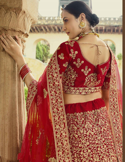 Red pure velvet stone and zari work bridal lehenga choli