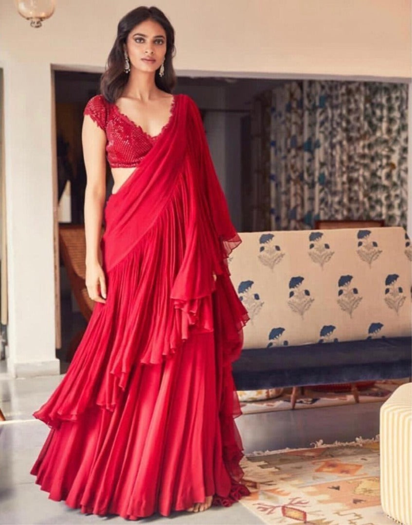 Red ruffle georgette partywear saree with sequence work blouse