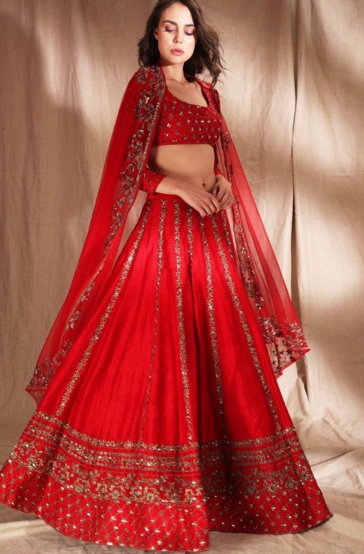 Red slub silk heavy embroidered wedding lehenga choli