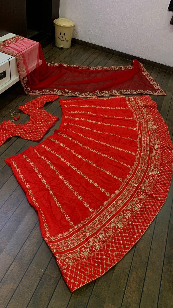 Red slub silk heavy embroidered wedding lehenga choli