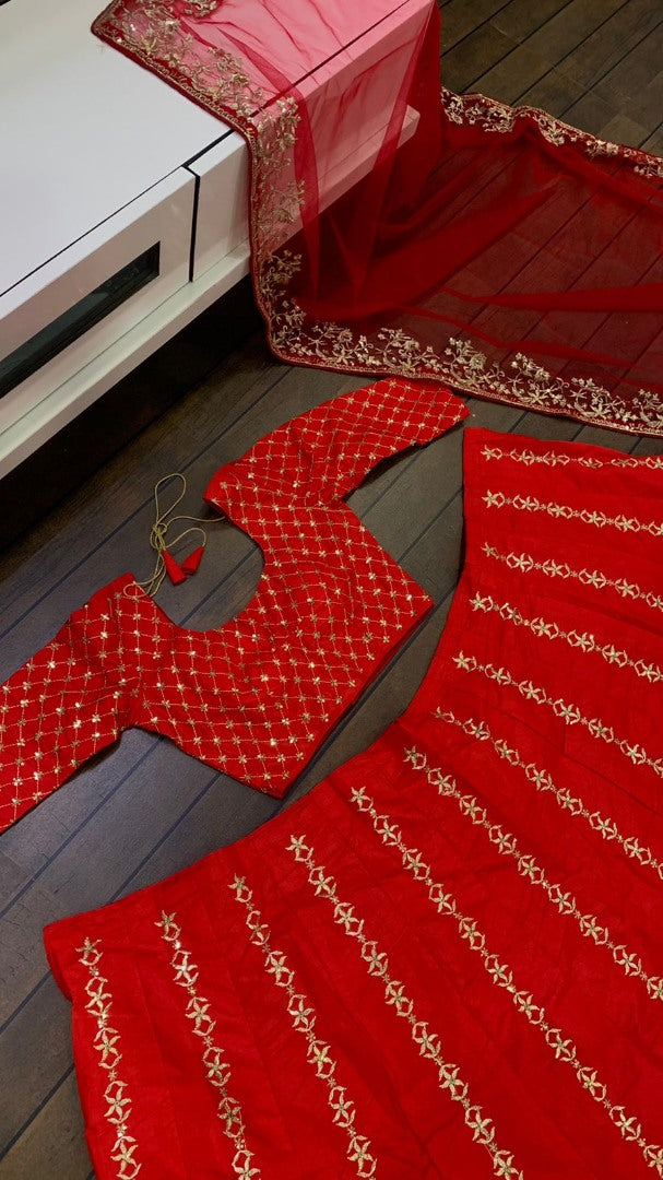 Red slub silk heavy embroidered wedding lehenga choli