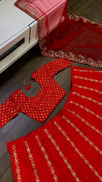 Red slub silk heavy embroidered wedding lehenga choli