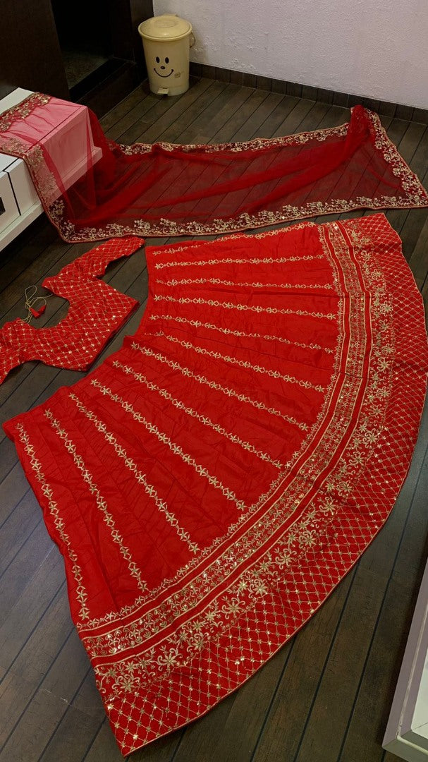 Red slub silk heavy embroidered wedding lehenga choli