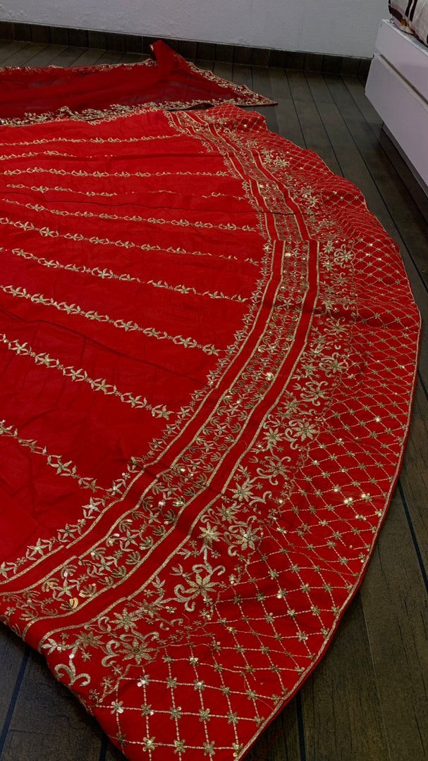 Red slub silk heavy embroidered wedding lehenga choli