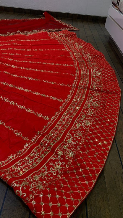 Red slub silk heavy embroidered wedding lehenga choli