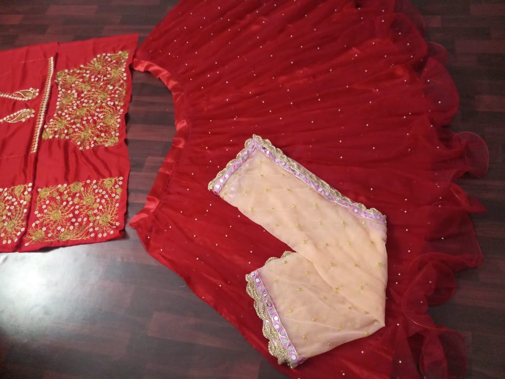 Red soft mono net designer embroidered wedding lehenga choli