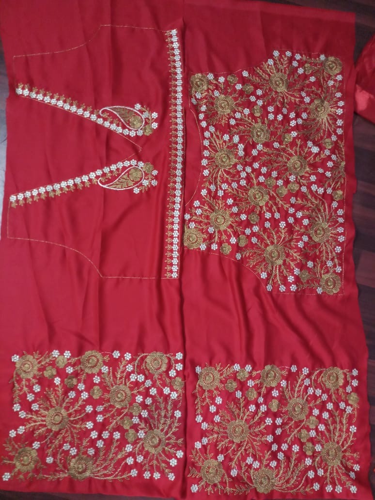 Red soft mono net designer embroidered wedding lehenga choli