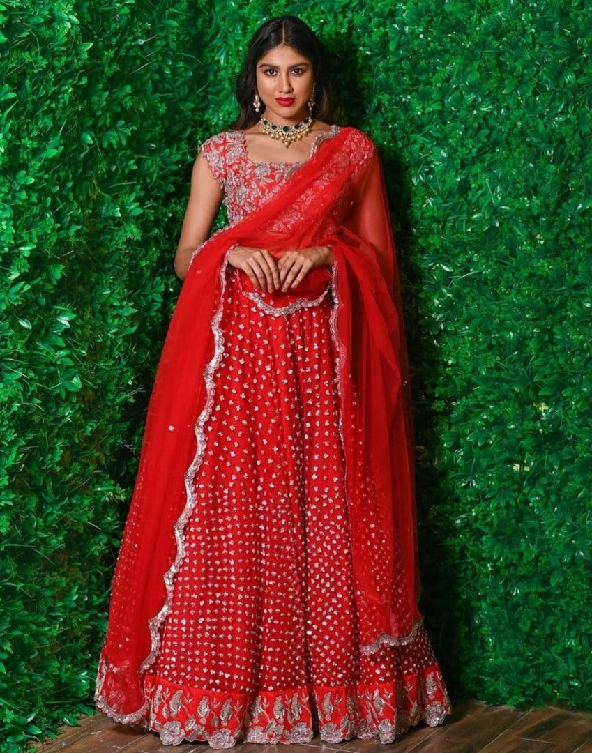 Red soft net sequence work wedding lehenga choli