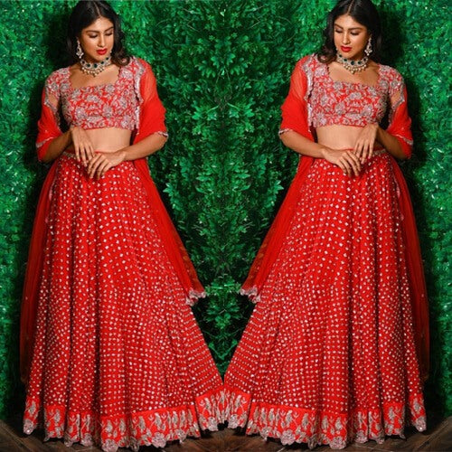Red soft net sequence work wedding lehenga choli