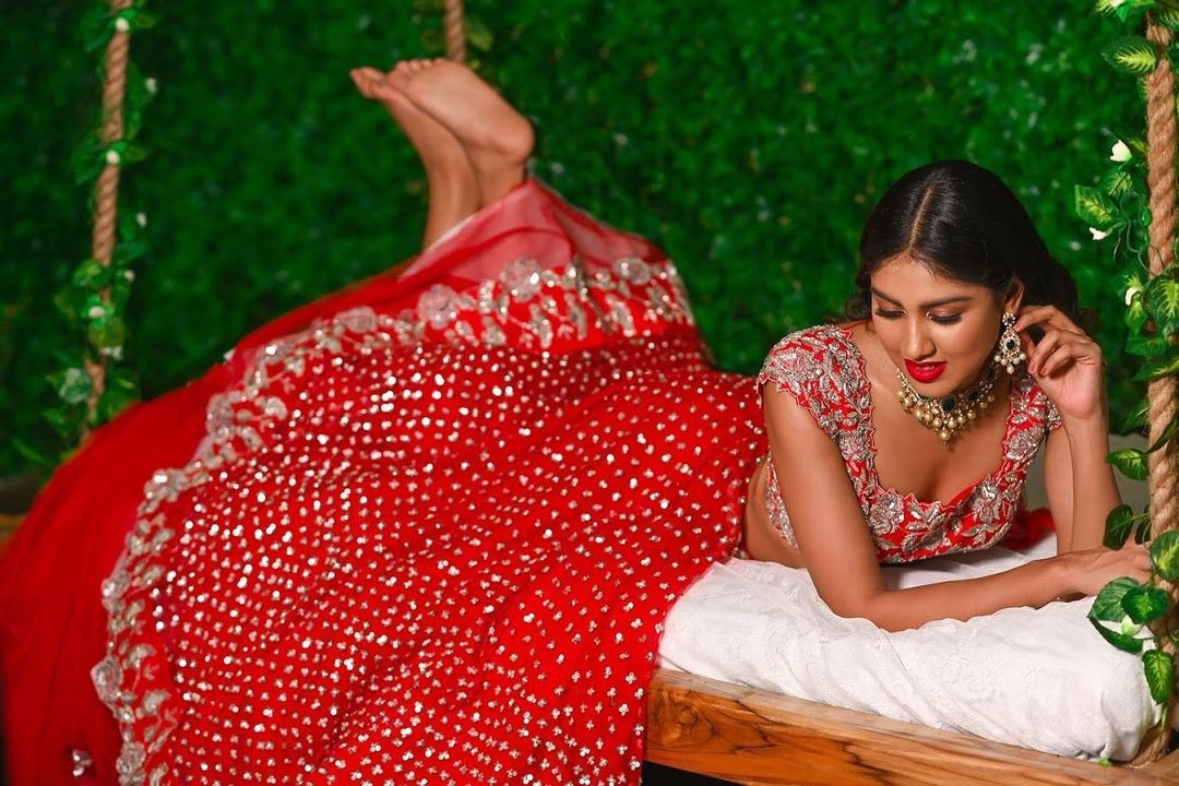 Red soft net sequence work wedding lehenga choli