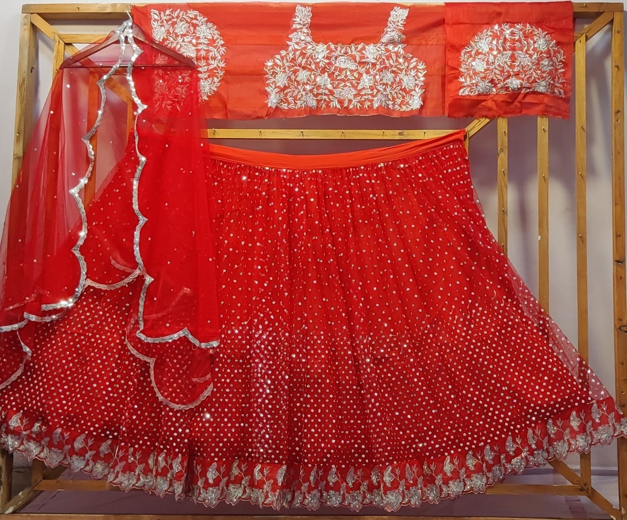 Red soft net sequence work wedding lehenga choli