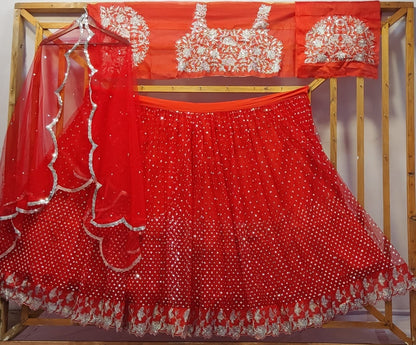Red soft net sequence work wedding lehenga choli