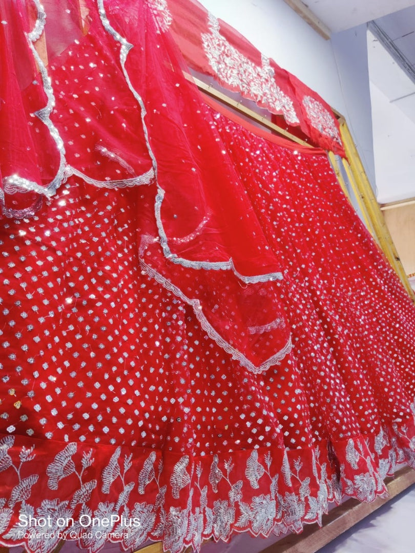 Red soft net sequence work wedding lehenga choli