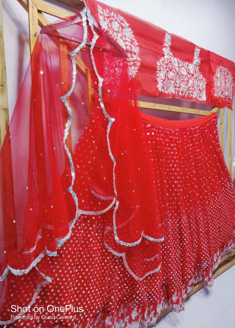 Red soft net sequence work wedding lehenga choli