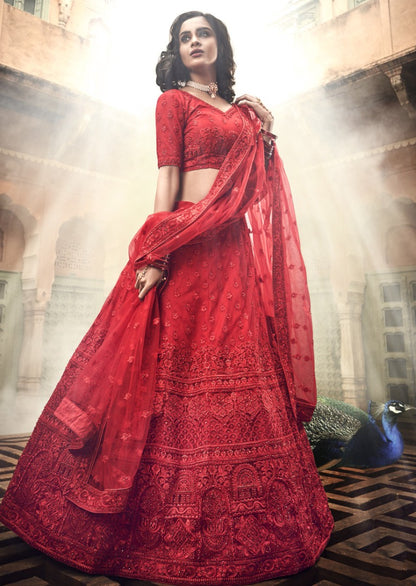 Red soft net thread work bridal heavy lehenga choli
