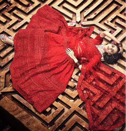 Red soft net thread work bridal heavy lehenga choli